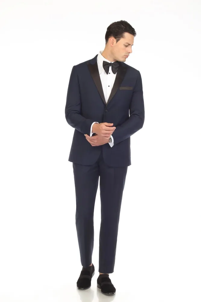 Navy tuxedo with black satin peak lapels and bow tie